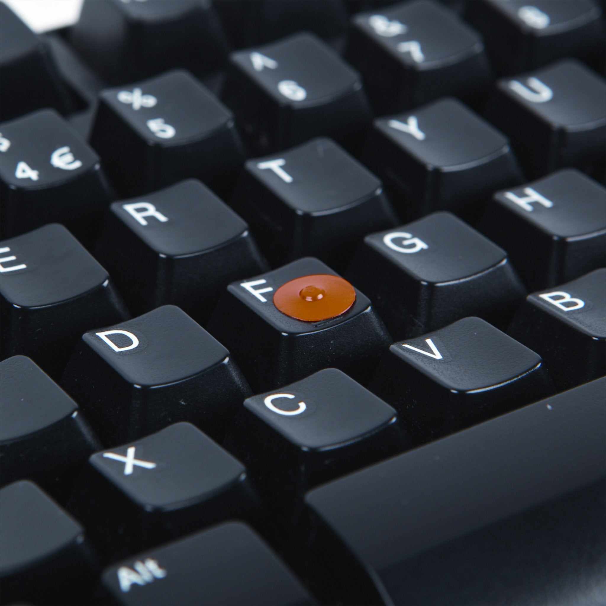 orange locdot on a computer keyboard key