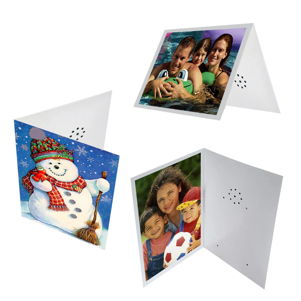 Three plain white cards decorated with personal photos or the front of a standard Christmas card