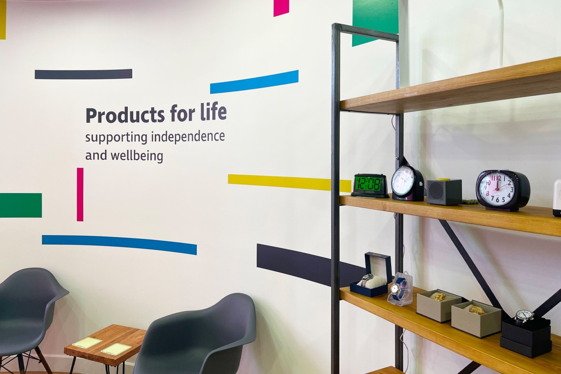 Selection of products displayed on oak shelving in the RNIB Store