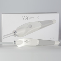 Image shows the wewalk cane with its box