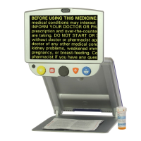 TOPAZ Portable Video Magnifier displaying yellow text on a black background from a medicine guide
