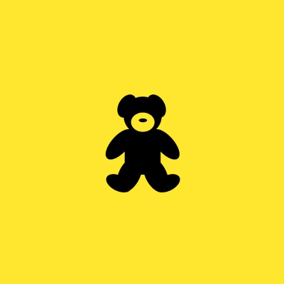 A yellow cover depicting a teddy bear