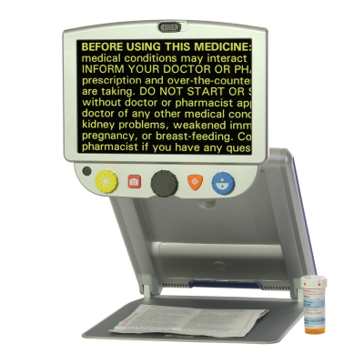 Portable video magnifier showing yellow text on screen