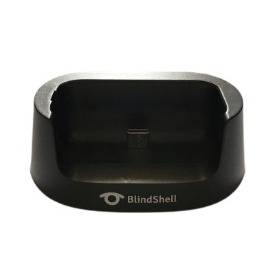 Image shows BlindShell Classic 2 charging cradle on a white background
