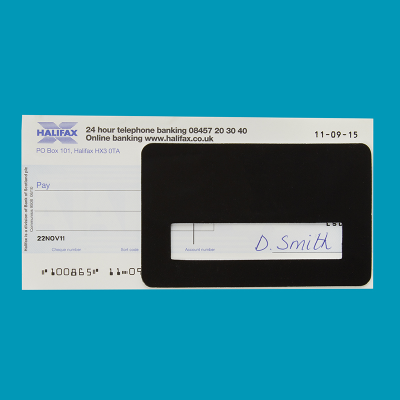 Signature guide on a cheque against a blue background