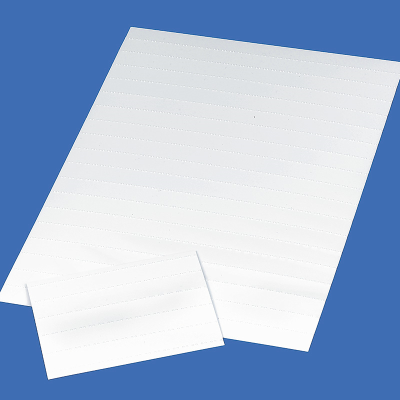 Notepaper and envelope writing guide placed on a sheet of paper