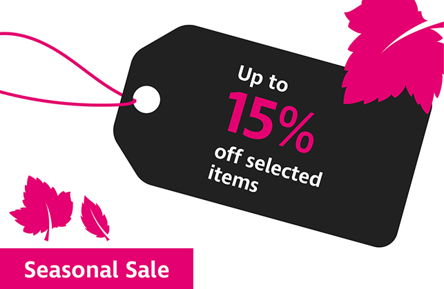Graphic of a black label reading up to 15% off selected items with pink leaves falling