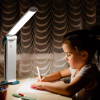 A child doing homework using the twist 2 go light