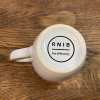Base of the mug with RNIB logo visible