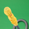 A yellow sock placed over a hoover nozzle and secured with an elastic band