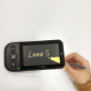 Image shows luna S being used to help write a note