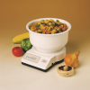 Kitchen scale with dried pasta in the bowl and other food items surrounding the scale