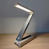 ZigZag portable folding light in use on a desk