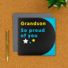 Grandson special day card on a desk with pen next to it