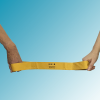 Running tether held by hands at either end against a blue background