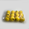 Twelve yellow balls in packaging