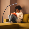 Relaxing while using the lamp to read a book