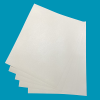 sheets of brailon fanned on a blue background