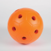Orange ball made from hard foam with holes so bells can be heard