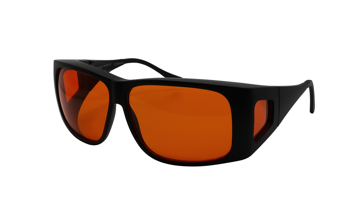 Black framed RNIB eyeshield glasses in the fitover style with orange tinted filter lenses