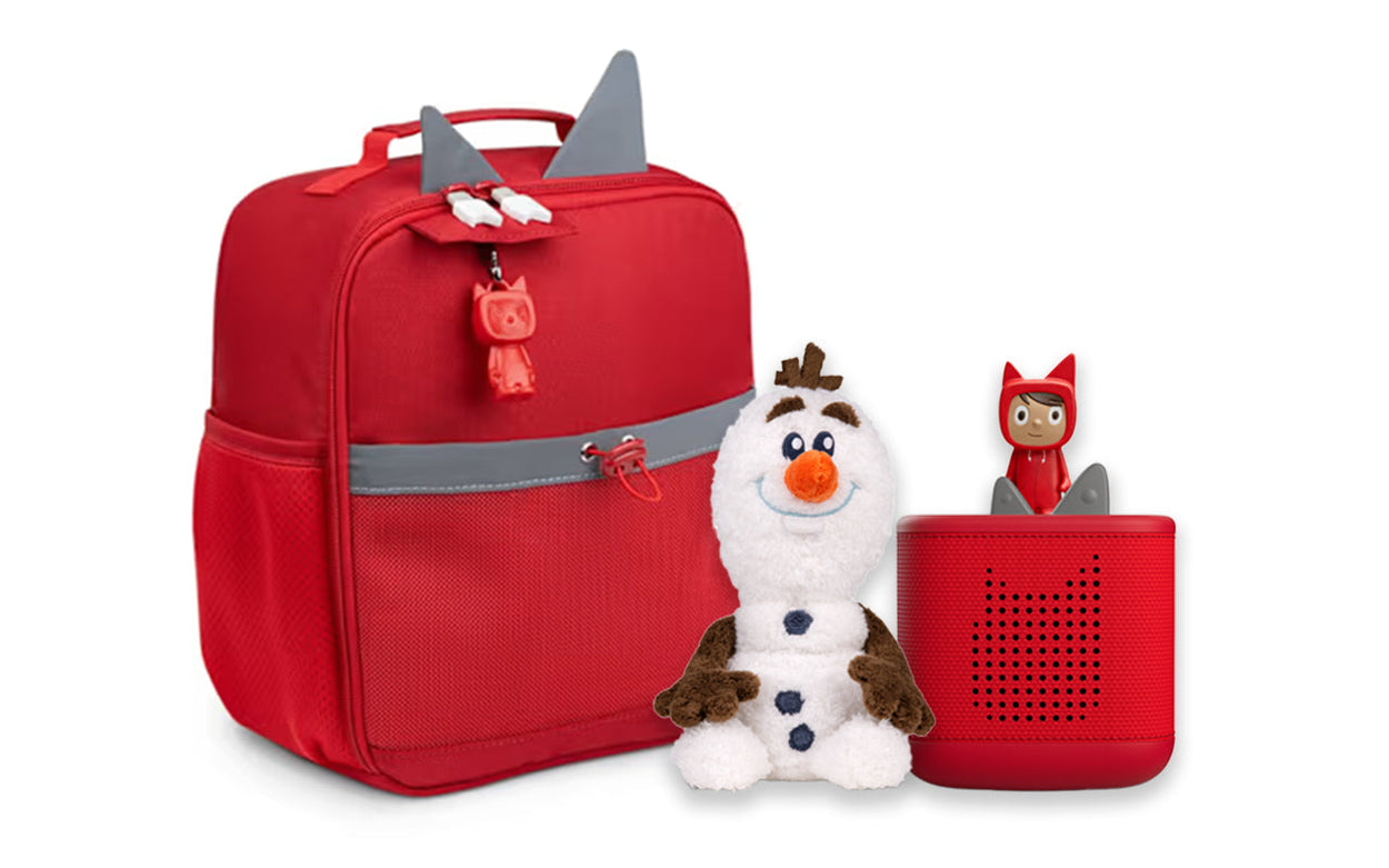 Red Tonies backpack with Creative Mini, Disney Olaf Cuddle Tonie, and red Toniebox 2 with Creative Tonie Rubie on top.