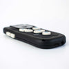 View of the Black Ikonn Controller with contrasting buttons and tactile marking from a side angle.