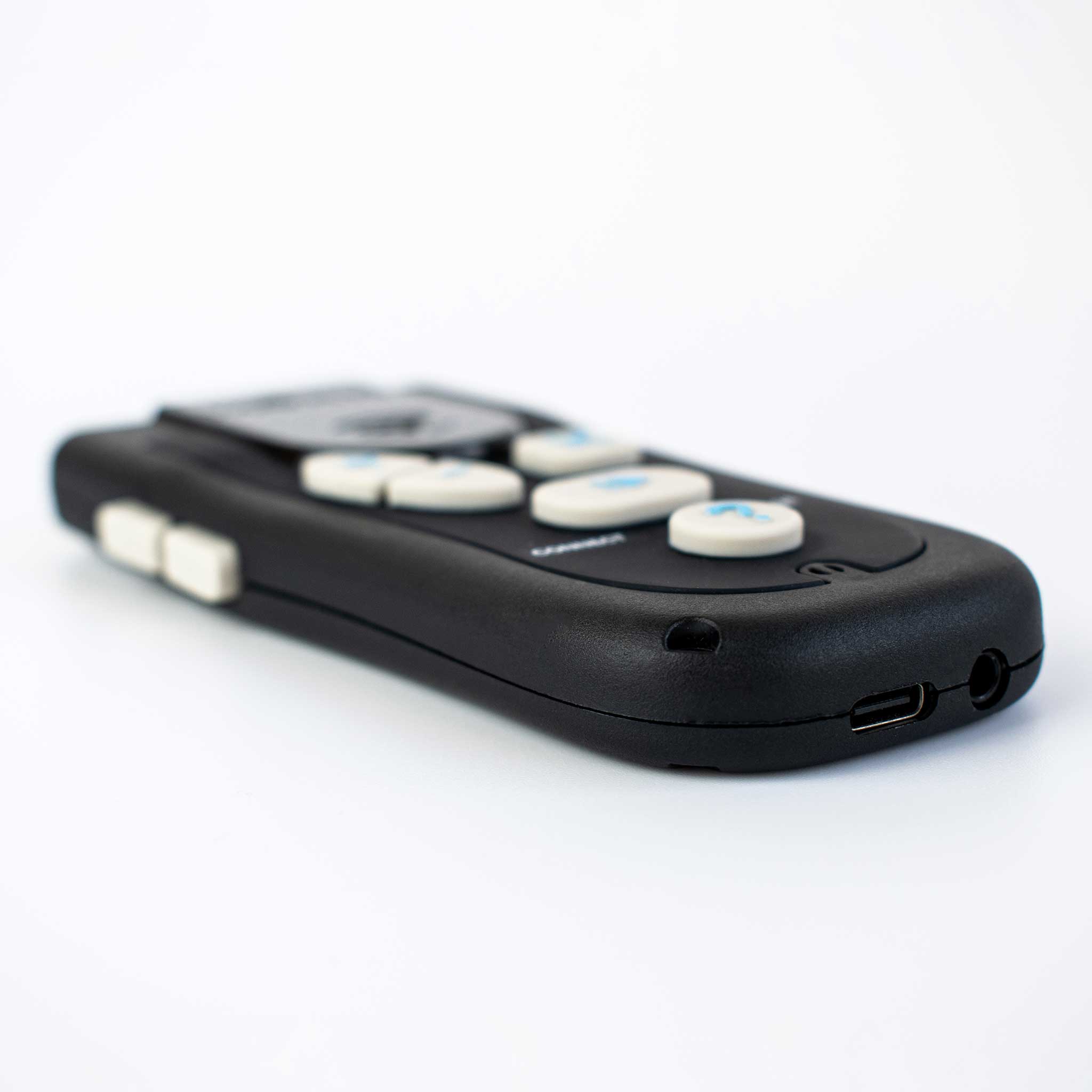 View of the Black Ikonn Controller with contrasting buttons and tactile marking from a side angle.