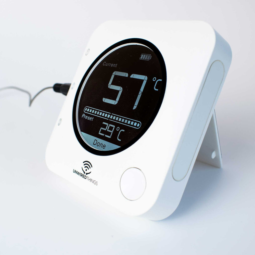 Digital thermometer with temperature display on a white background