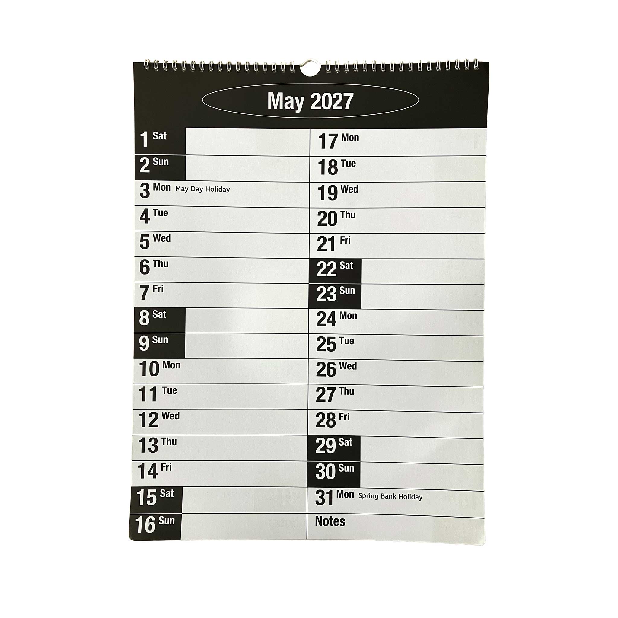 A spiral-bound May 2027 wall calendar page shown against a plain white background, with black text and highlighted weekends in dark gray blocks.