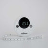 White Ikonn tape measure with contrasting back on and off button. Has a visual display showing the 25.3cm with part of the tape measure showing.