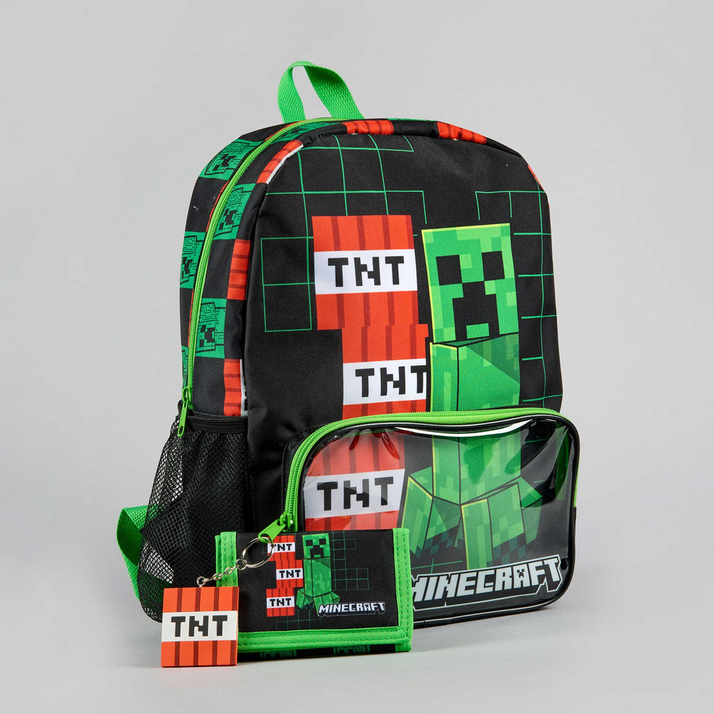 A Minecraft backpack set with a black and green backpack, a matching clear pencil pouch, and a small keychain wallet featuring pixelated TNT and Creeper graphics, photographed on a light gray background.