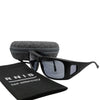 Eyeshiedls with grey lenses and a carrying case on a white background, featuring the RNIB logo.