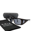Eyeshiedls with grey lenses and a carrying case on a white background, featuring the RNIB logo.