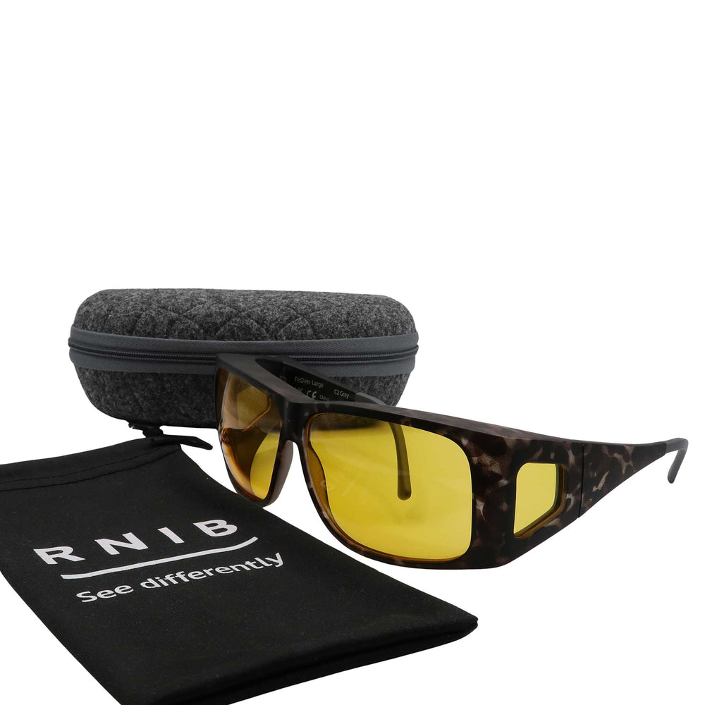 Eyeshiedls with yellow lenses and a carrying case on a white background, featuring the RNIB logo.