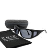 Eyeshiedls with grey lenses and a carrying case on a white background, featuring the RNIB logo.
