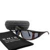 Eyeshiedls with grey lenses and a carrying case on a white background, featuring the RNIB logo.