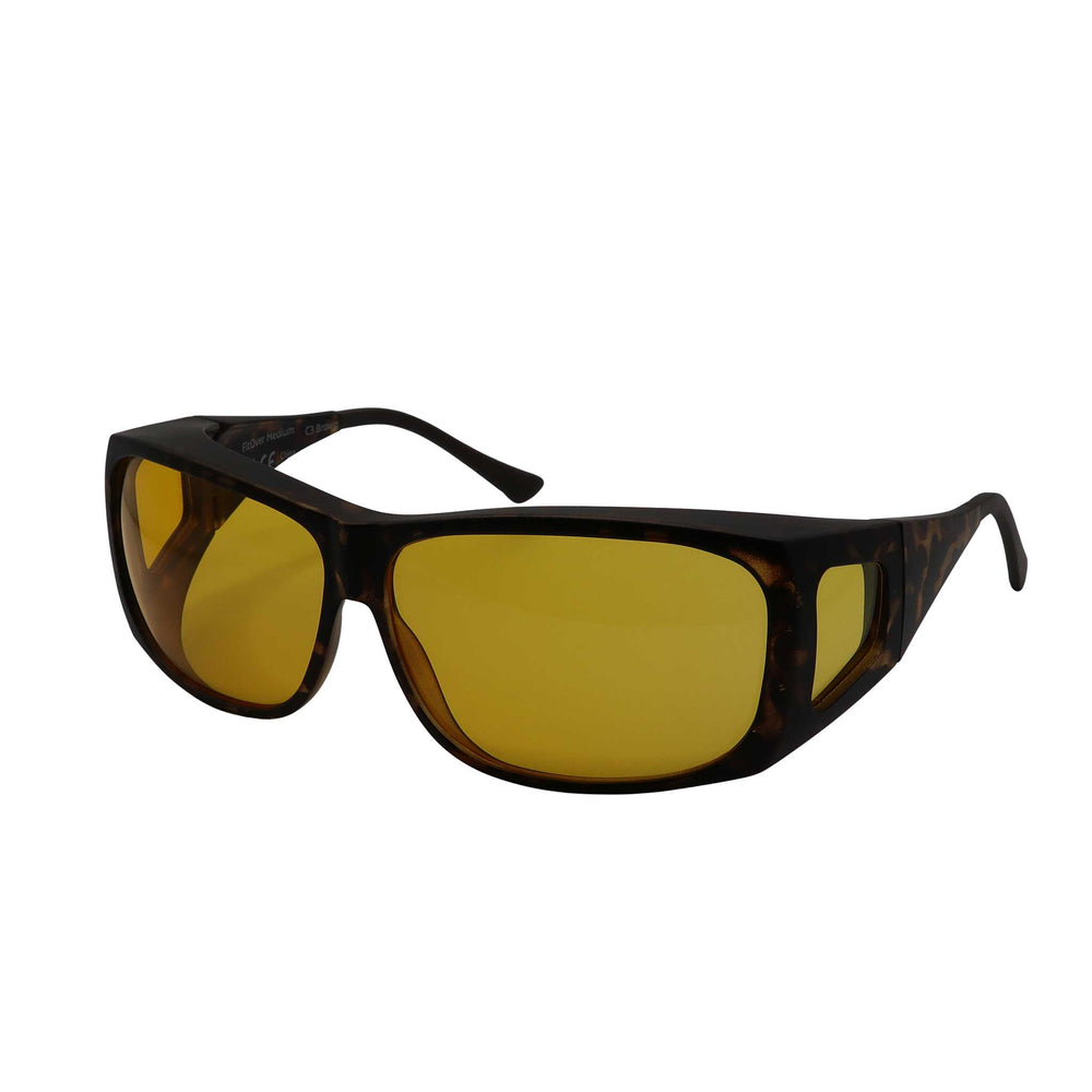 Side angled view of RNIB medium FitOver eyeshield glasses with brown tortoiseshell frames and yellow tinted lenses.