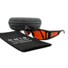 Eyeshiedls with amber lenses and a carrying case on a white background, featuring the RNIB logo.