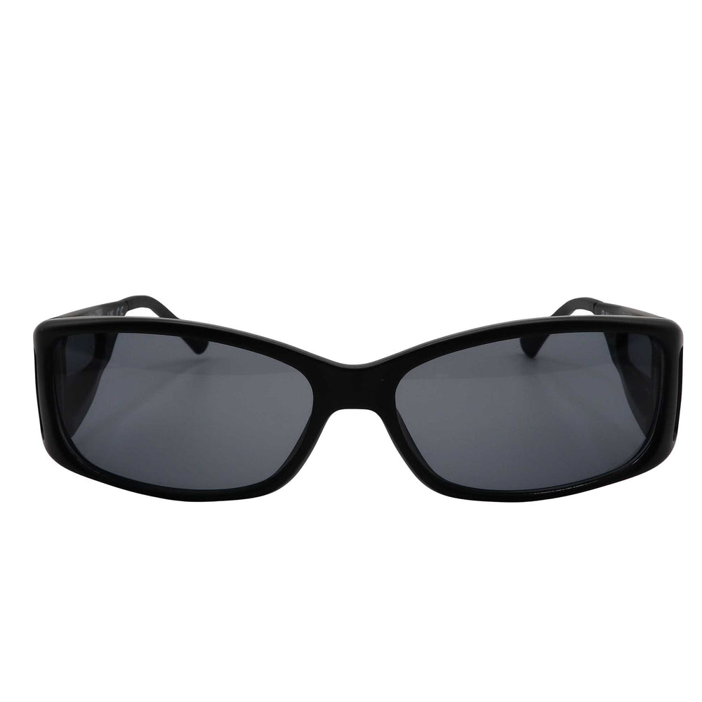 RNIB medium eyeshield glasses with black frames and grey tinted lenses.