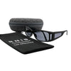 Eyeshiedls with grey lenses and a carrying case on a white background, featuring the RNIB logo.