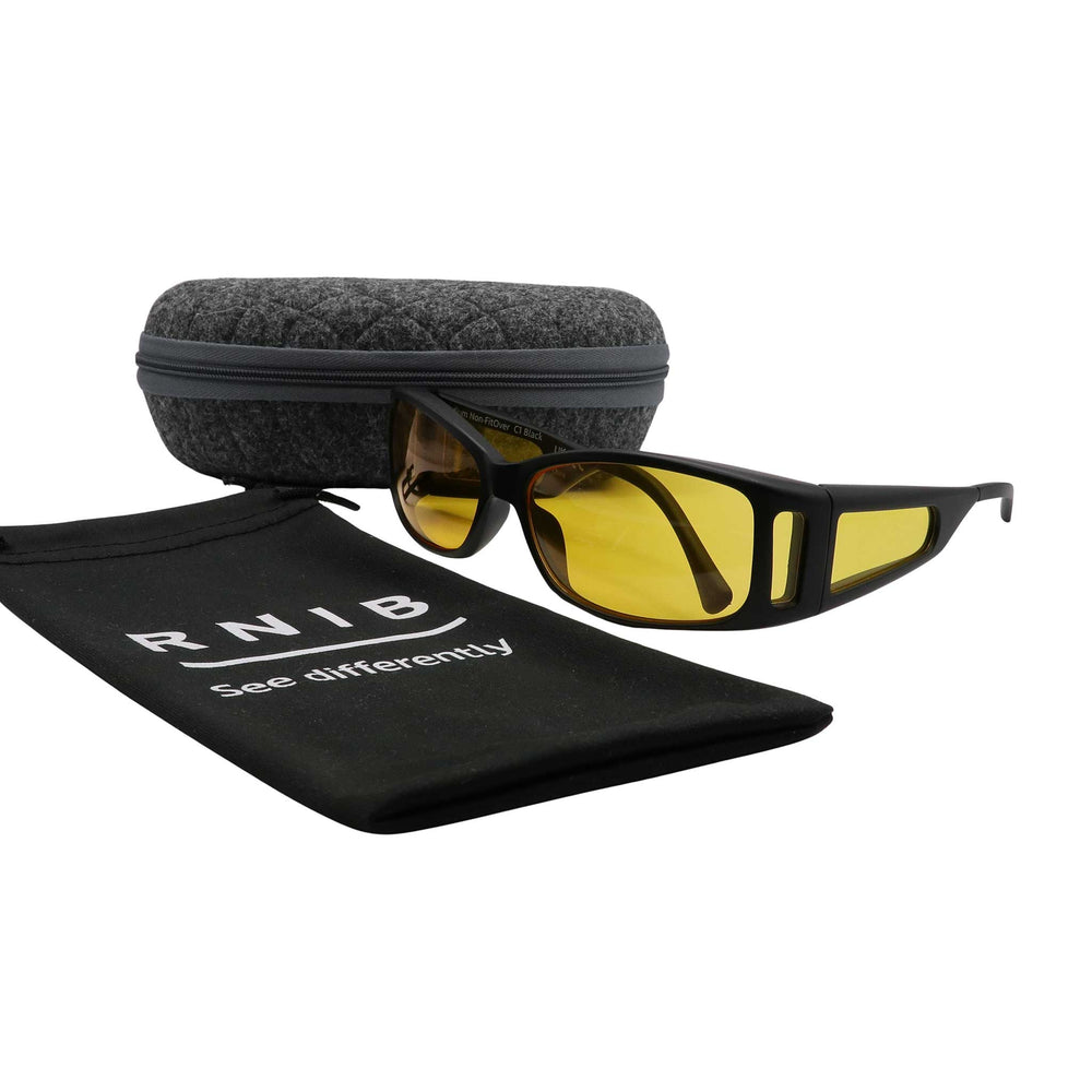 Eyeshiedls with yellow lenses and a carrying case on a white background, featuring the RNIB logo.