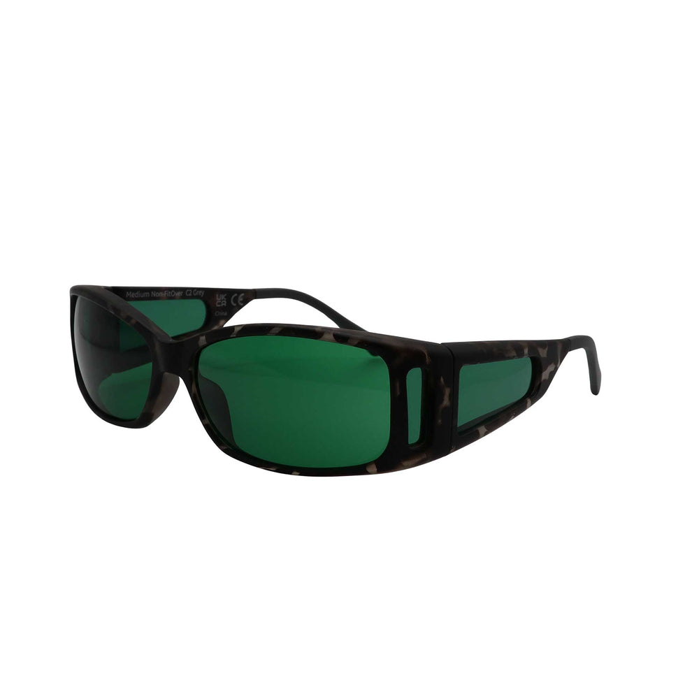 Side angled view of RNIB medium Eyeshield glasses with grey tortoiseshell frames and green tinted lenses.