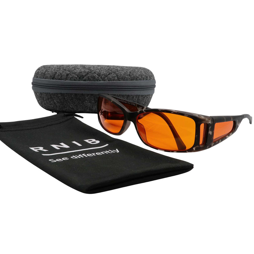 Eyeshiedls with orange lenses and a carrying case on a white background, featuring the RNIB logo.
