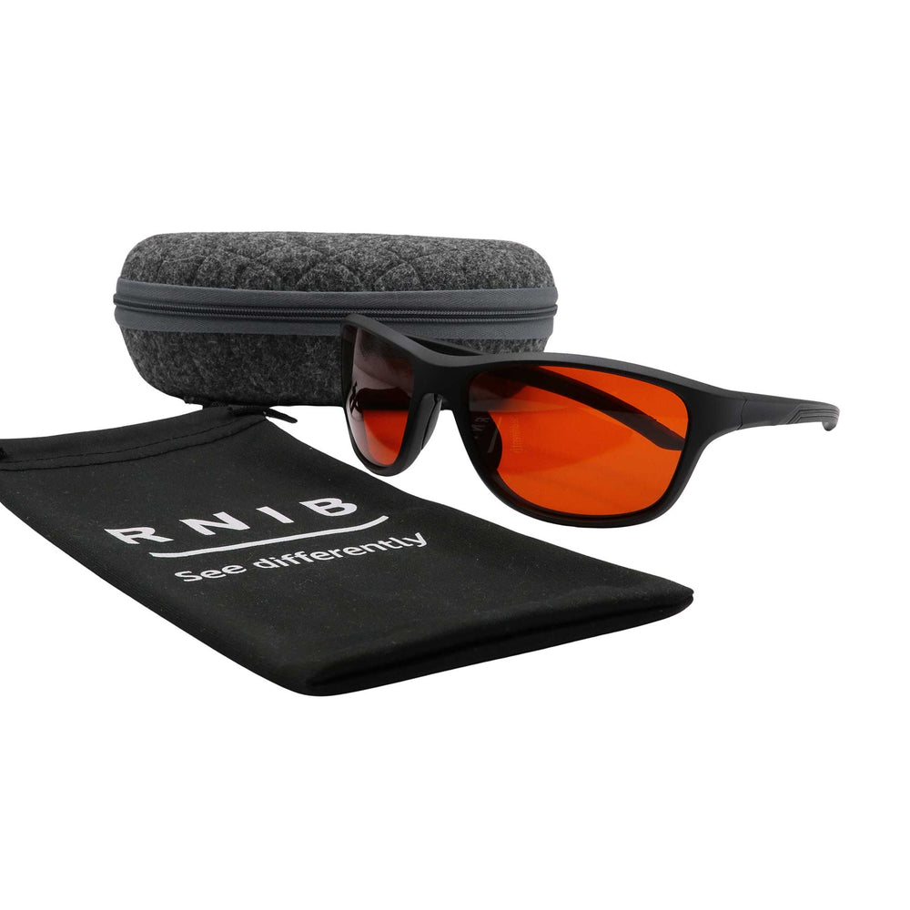 Eyeshiedls with amber lenses and a carrying case on a white background, featuring the RNIB logo.