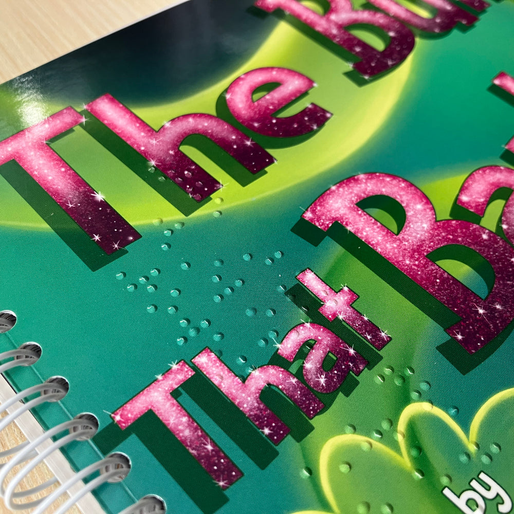 Close-up of braille on cover of The Bum That Barked