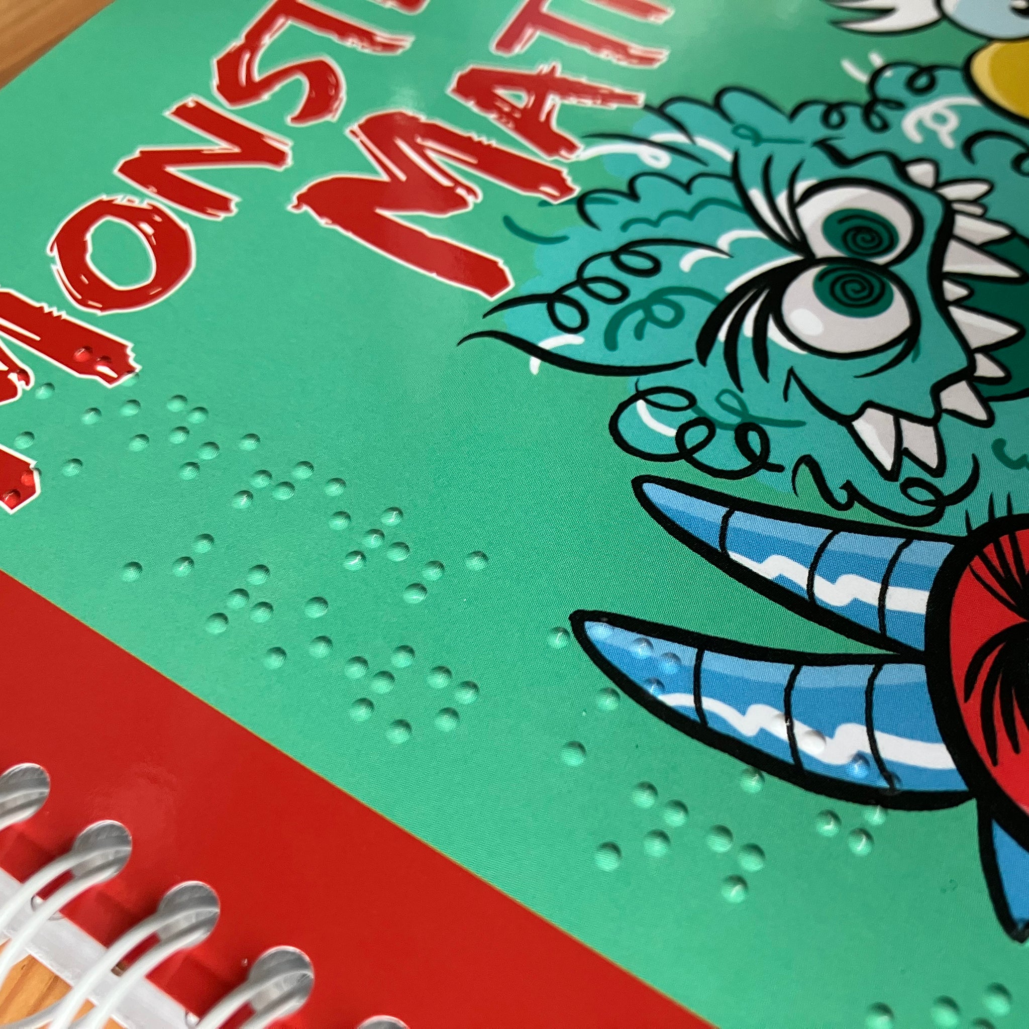 Close-up of braille on the book cover