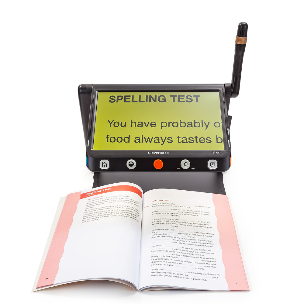 CloverBook Pro being used to scan an open book. The text on screen is black and the text background is yellow.