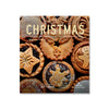 Image shows the front cover of the M&s food catalogue featuring different Christmas designs of mince pies.