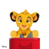 Plush toy of a lion character on top of a red electronic device with Disney logo.
