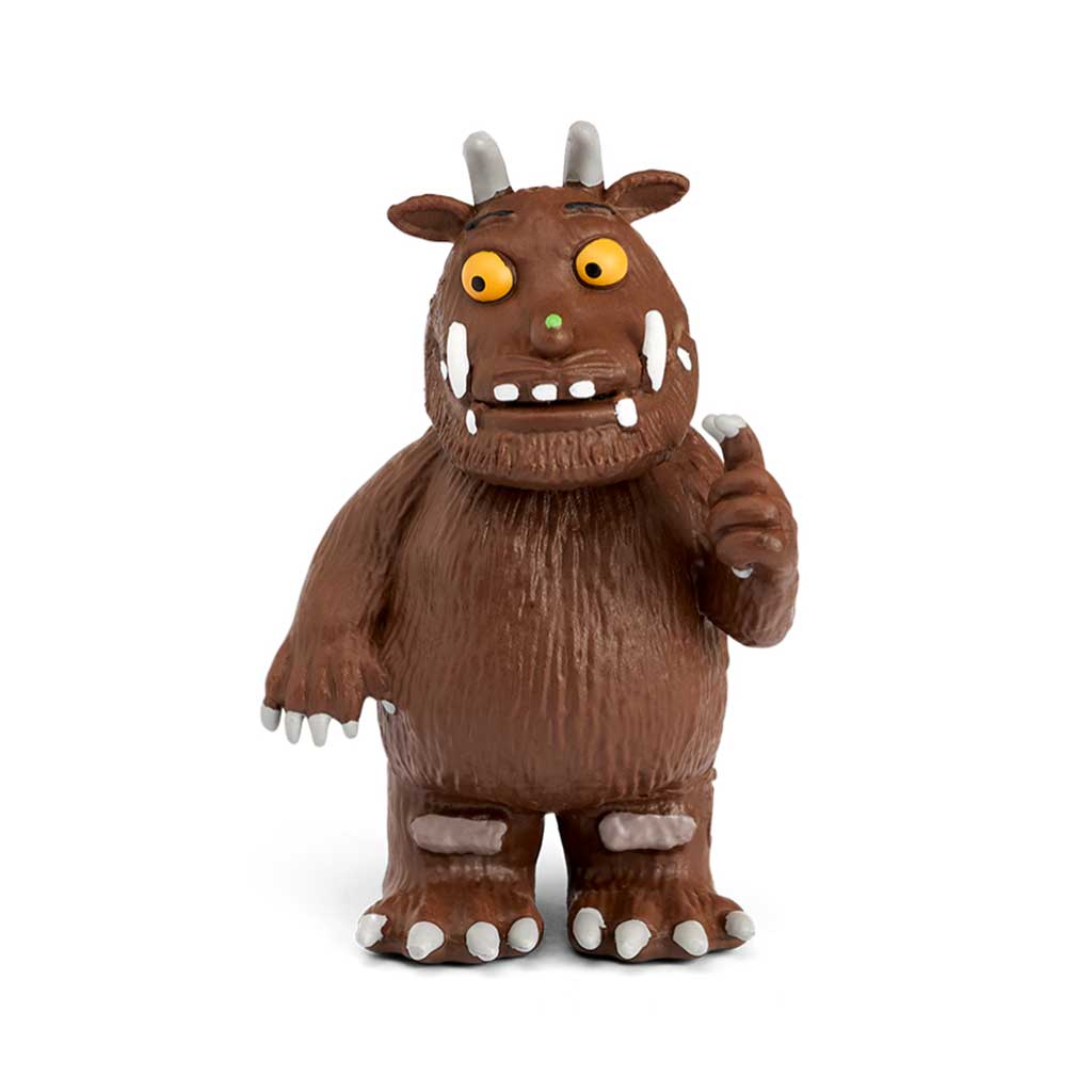Brown cartoon-like creature with yellow eyes and white teeth on a white background